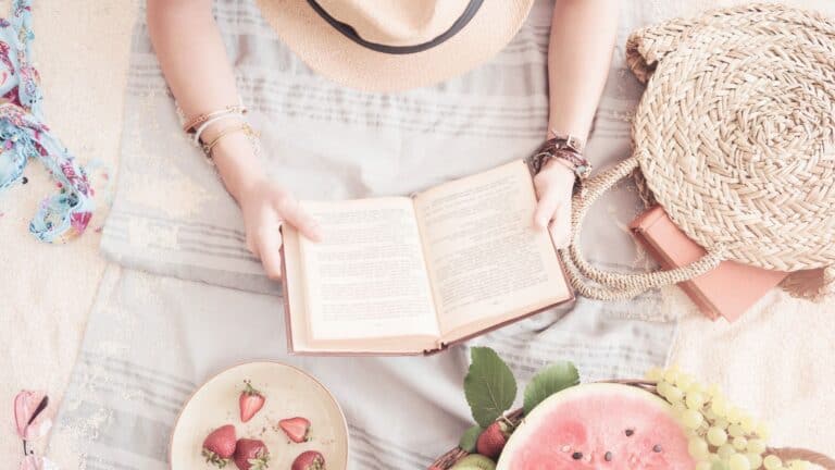 women reading and eating fruit